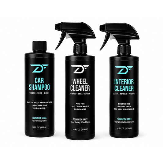 Three black Detailers Finest Foundation Series brand car care bottles on a white background: Car Shampoo, Wheel Cleaner, and Interior Cleaner.