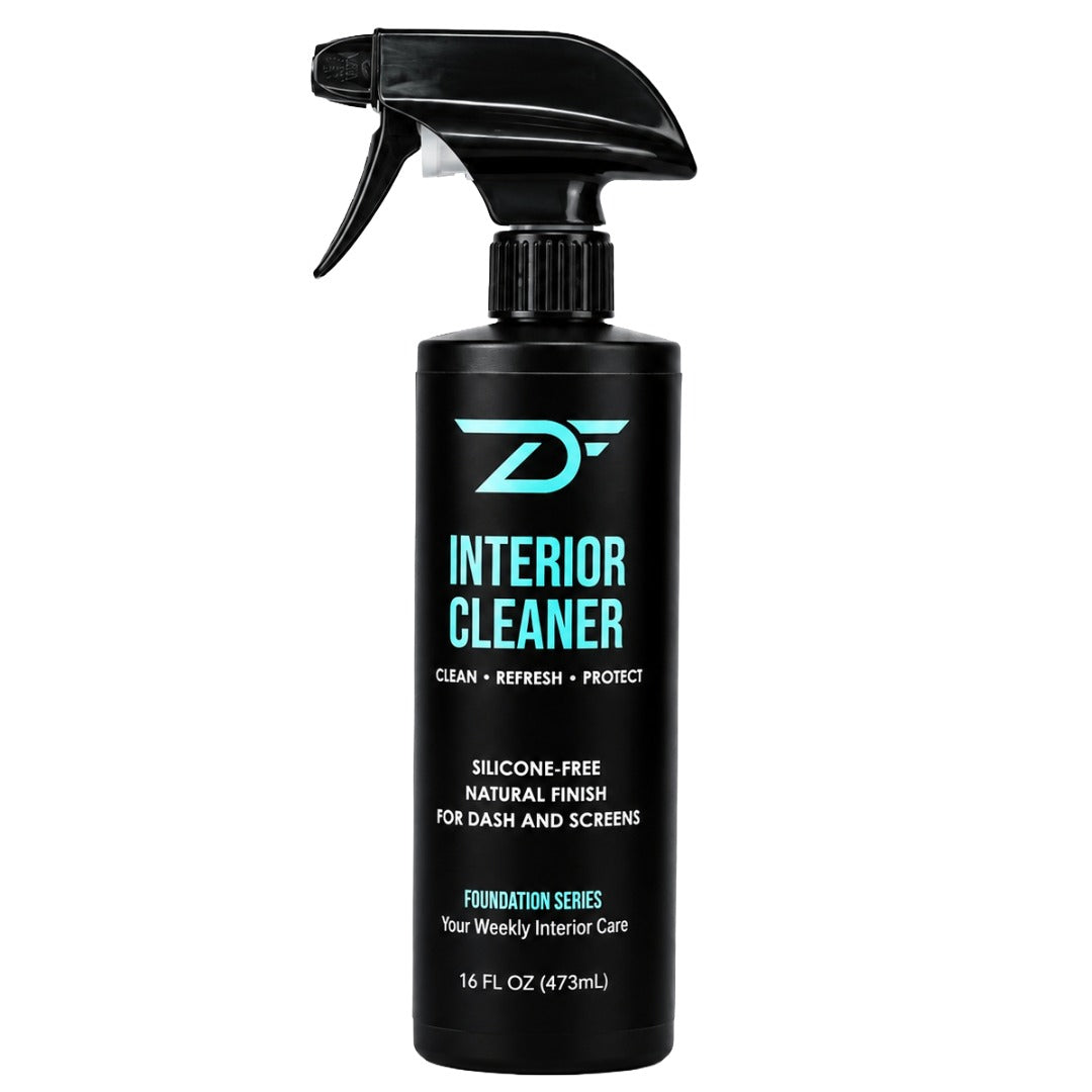 A 16 fl oz spray bottle of Detailers Finest Foundation Series Interior Cleaner on a solid white background. The bottle is black with a black trigger spray top and features mint and white text and logo detailing.