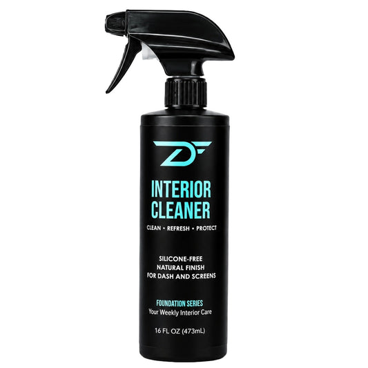 A 16 fl oz spray bottle of Detailers Finest Foundation Series Interior Cleaner on a solid white background. The bottle is black with a black trigger spray top and features mint and white text and logo detailing.
