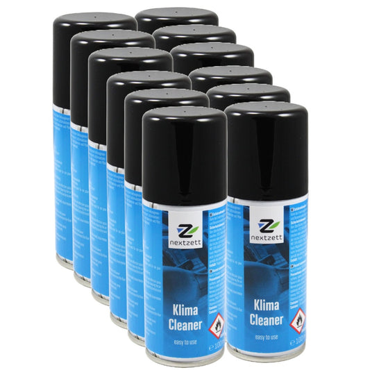 Multiple cans of nextzett Klima Cleaner ETU on a white background