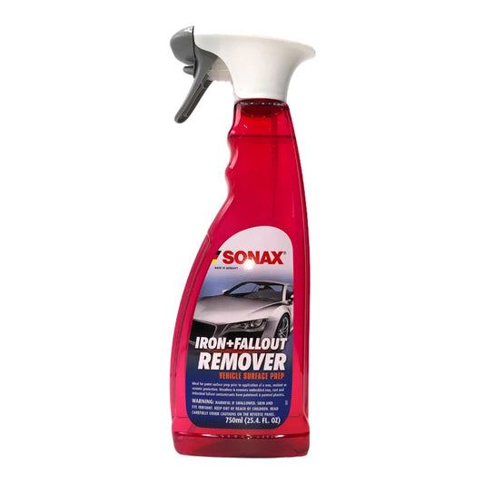 A bottle of Sonax Iron + Fallout Remover single surface product, featuring a translucent red bottle, white spray nozzle, and a label with a car graphic on a white background.