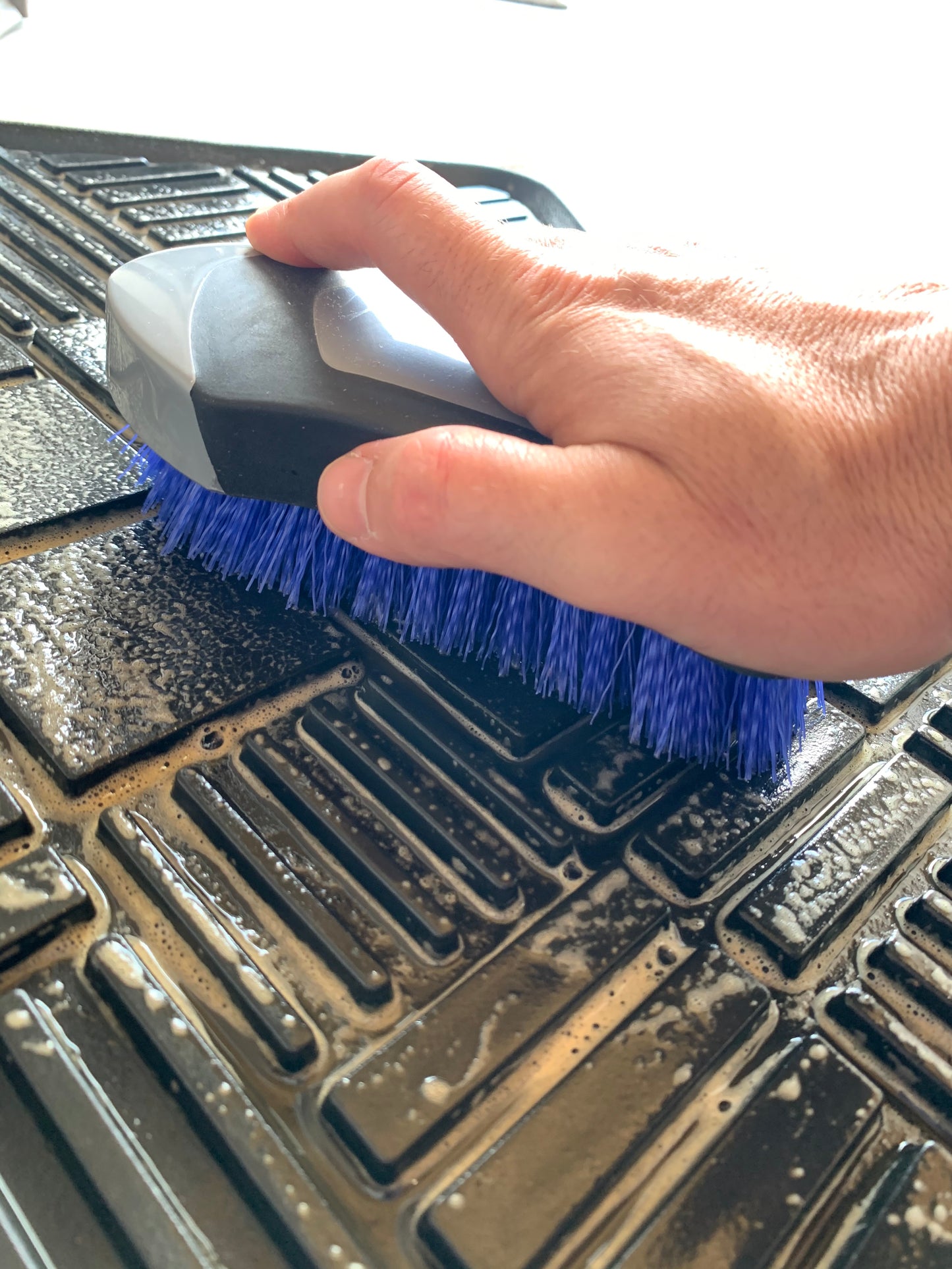 Scrubbing floor mat with Deluxe Carpet and Upholstery Brush