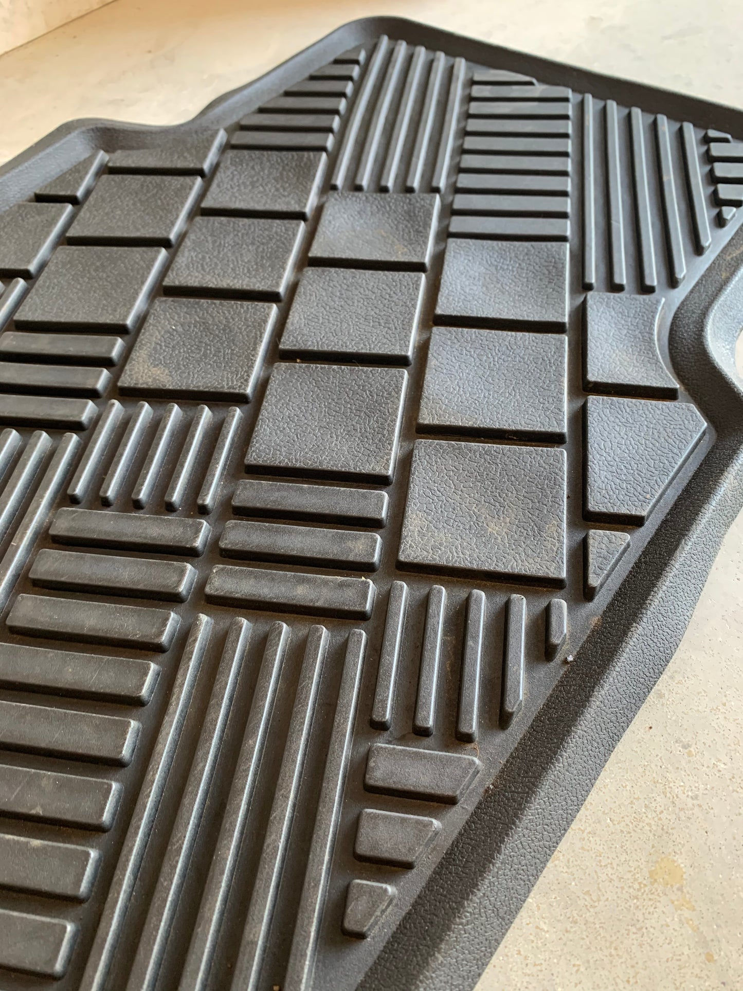 Clean rubber floor mats after treating with Blitz
